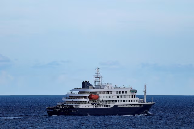 The cruise ship MV Hondius, affected by a hantavirus outbreak, leaves the port of Granadilla de Abona, in Tenerife, Spain, May 11, 2026. REUTERS/Hannah McKay/File Photo