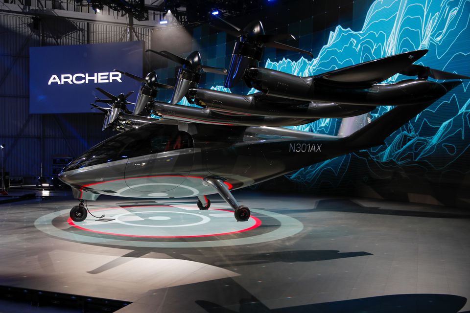 Flying taxi company Archer Aviation prepare for the debut of their all-electric aircraft from a facility in Hawthorne, California, U.S. June 8, 2021. Flying taxi company Archer Aviation prepare for the debut of their all-electric aircraft from a facility in Hawthorne, California, U.S. June 8, 2021.