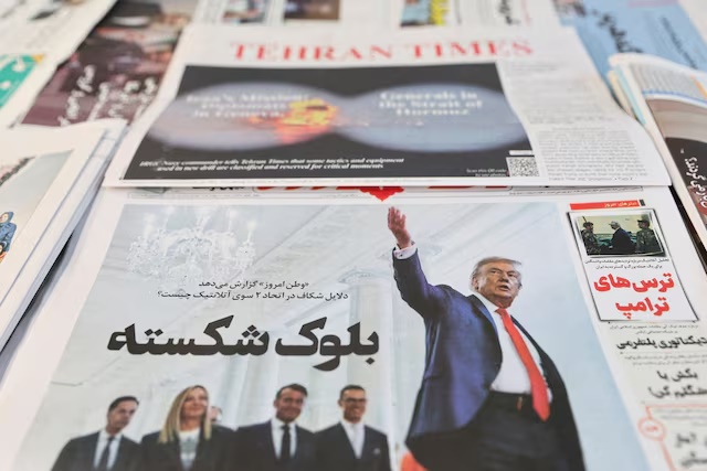 An Iranian newspaper with a cover photo of U.S. President Donald Trump, in Tehran, Iran, February 17, 2026. Majid Asgaripour/WANA (West Asia News Agency) via REUTERS/File Photo