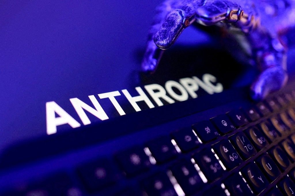 Anthropic logo, a keyboard, and a robotic hand in this illustration created on June 5, 2026. REUTERS