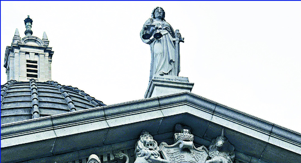 A statue of Lady Justice at the Court of Final Appeal and judge Jonathan Sumption. A statue of Lady Justice at the Court of Final Appeal and judge Jonathan Sumption.