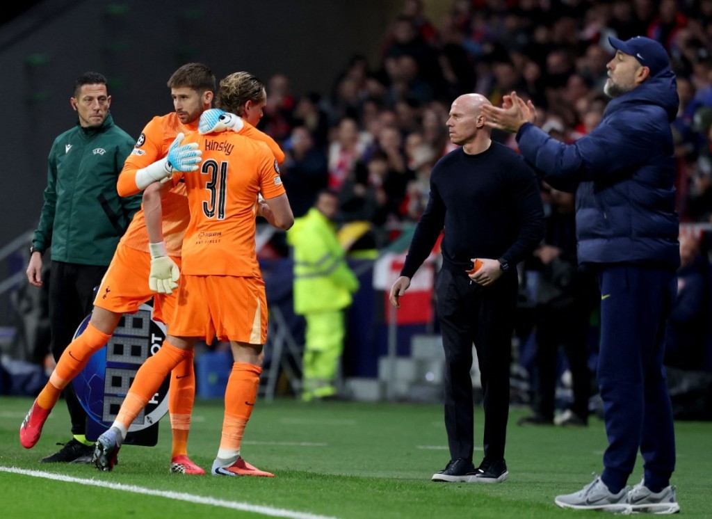Antonin Kinsky is hugged by Guglielmo Vicario as he is substituted while Igor Tudor, right, shouts instructions. AFP 