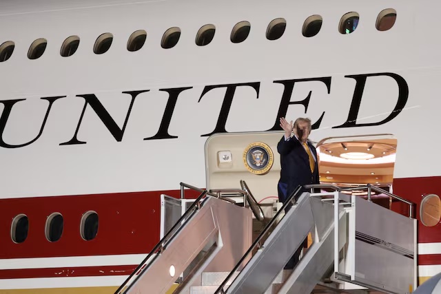 U.S. President Donald Trump boards the new, Qatari-gifted Air Force One after arriving on one of the older planes operating as Air Force One, to return to Washington after his participation in a NATO leaders summit in Turkey, at RAF Mildenhall, in Suffolk, Britain, July 8, 2026. REUTERS/Jonathan Ernst/File Photo