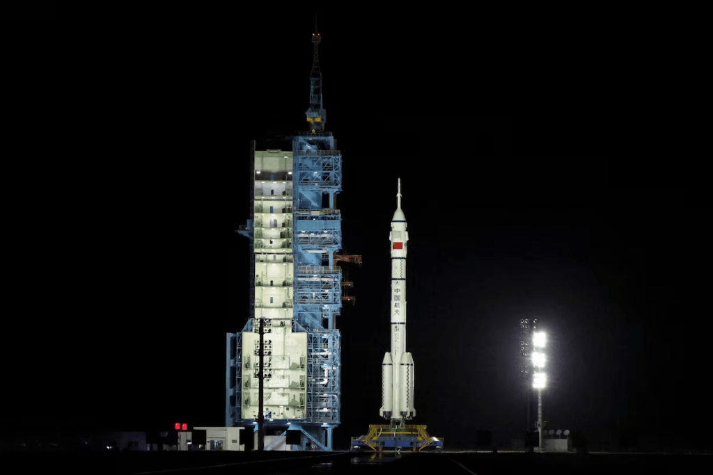 A Long March-2F rocket carrying the Shenzhou-19 spacecraft sits at the launch pad before taking off from the Jiuquan Satellite Launch Center for a crewed mission to China's Tiangong space station, near Jiuquan, Gansu province, China October 30, 2024. REUTERS/Florence Lo/File Photo