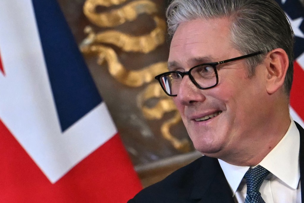 Britain's Prime Minister Keir Starmer gestures during a joint press conference with US President Donald Trump (unseen) following their meeting at Chequers, in Aylesbury, central England, on September 18, 2025, on the second day of the US President's second State Visit.  (Photo by ANDREW CABALLERO-REYNOLDS / AFP)