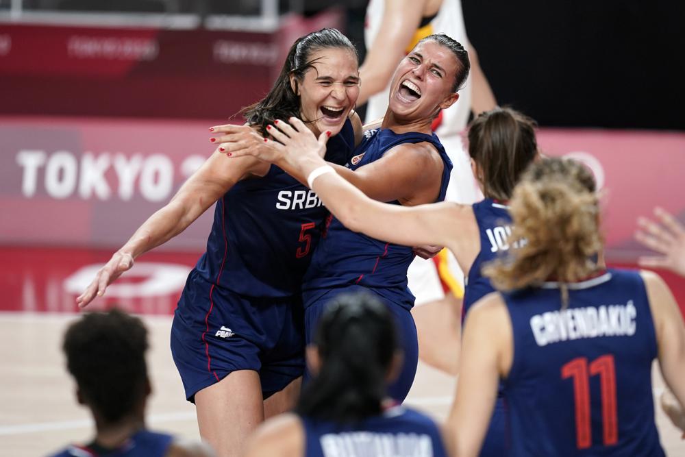 Serbia's Sonja Vasic, left, and Ana Dabovic celebrate at the end of a women's basketball quarterfinal round game against China at the 2020 Summer Olympics, Wednesday, August 4, 2021, in Saitama, Japan. Serbia's Sonja Vasic, left, and Ana Dabovic celebrate at the end of a women's basketball quarterfinal round game against China at the 2020 Summer Olympics, Wednesday, August 4, 2021, in Saitama, Japan.