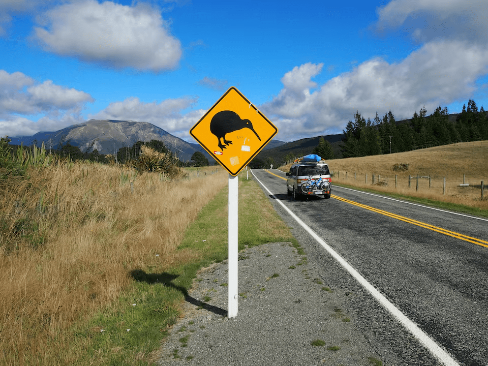Holidaymakers drive past a road sign at St. Arnaud on the South Island March 27, 2016. Reuters Holidaymakers drive past a road sign at St. Arnaud on the South Island March 27, 2016. Reuters