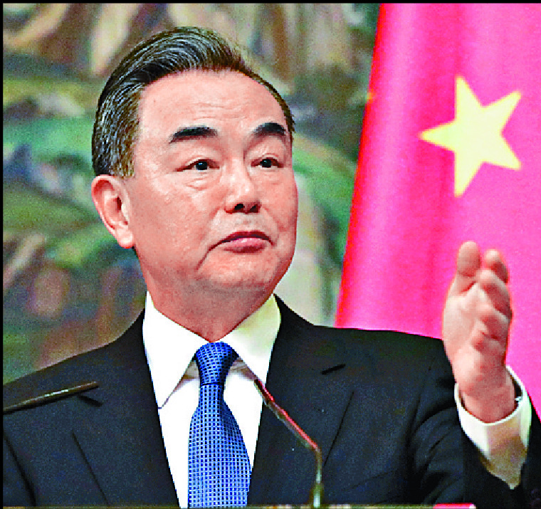 Wang Yi strikes a more conciliatory tone with the incoming US administration of Joe Biden. REUTERS, AP Wang Yi strikes a more conciliatory tone with the incoming US administration of Joe Biden. REUTERS, AP