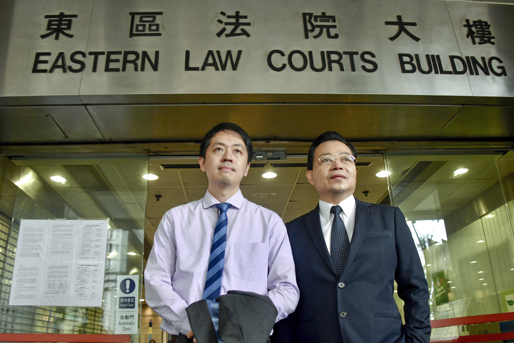 Victor Yeung, right, with Ted Hui. Victor Yeung, right, with Ted Hui.