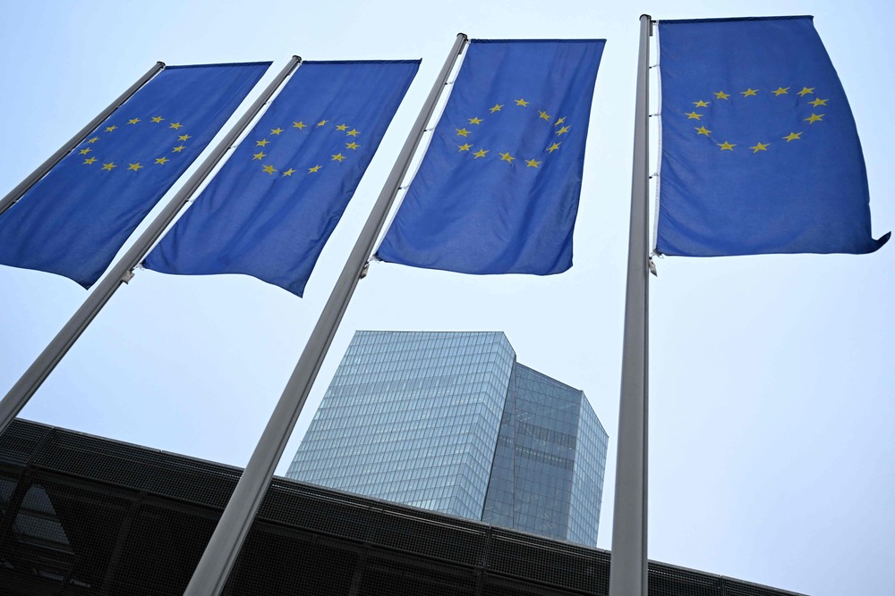 Flags of the European Union flutter in front of the headquarters of the European Central Bank (ECB) in Frankfurt am Main, western Germany, on December 12, 2024. AFP