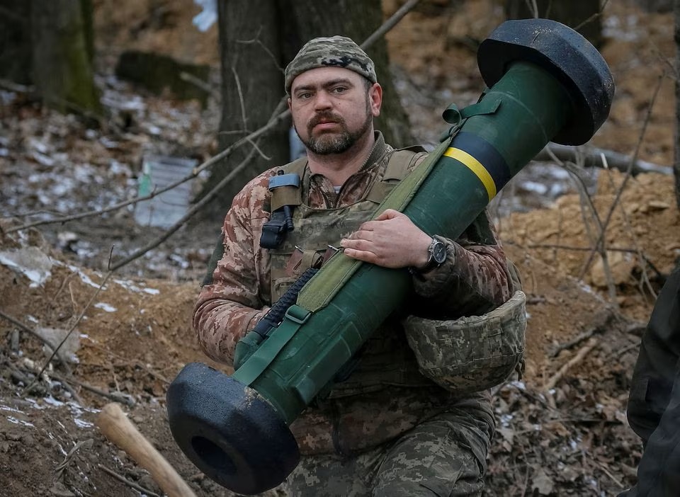 A Ukrainian service member holds a Javelin missile system at a position on the front line in the north Kyiv region, Ukraine. (Reuters) A Ukrainian service member holds a Javelin missile system at a position on the front line in the north Kyiv region, Ukraine. (Reuters)