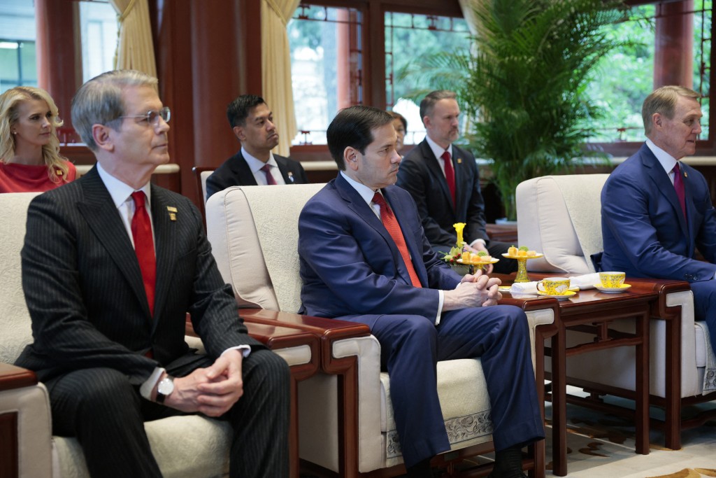 US Treasury Secretary Scott Bessent (L) and US Secretary of State Marco Rubio (C) look on as US President Donald Trump meets with China’s President Xi Jinping on the sidelines of their visit to Zhongnanhai Garden in Beijing on May 15, 2026. (Photo by Evan Vucci / POOL / AFP)