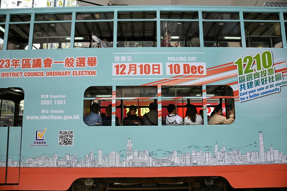 The reduction in directly elected district council seats won't hamper voter turnout, says Erick Tsang. The campaign season is in full swing. AFP, SING TAO The reduction in directly elected district council seats won't hamper voter turnout, says Erick Tsang. The campaign season is in full swing. AFP, SING TAO