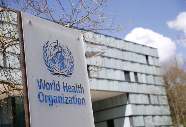 A logo is pictured outside a building of the World Health Organization (WHO) during an executive board meeting on update on the coronavirus disease (COVID-19) outbreak, in Geneva, Switzerland, April 6, 2021. REUTERS/Denis Balibouse 