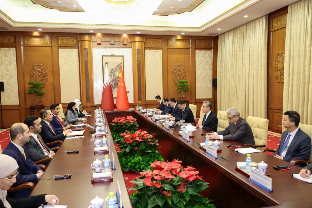 Chinese Foreign Minister Wang Yi (third left) meets with Prime Minister and Minister of Foreign Affairs of Qatar Sheikh Mohammed bin Abdulrahman Al Thani (fourth left) in Beijing on Sept 8, 2026. (PHOTO/XINHUA)