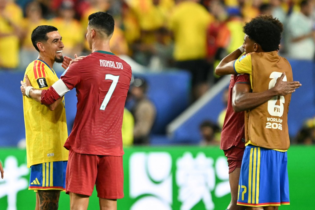 Colombia's defender #02 Daniel Munoz and Portugal's forward #07 Cristiano Ronaldo talk after the 2026 World Cup Group K football match between Colombia and Portugal at the Miami Stadium in Miami Gardens on June 27 (AFP)