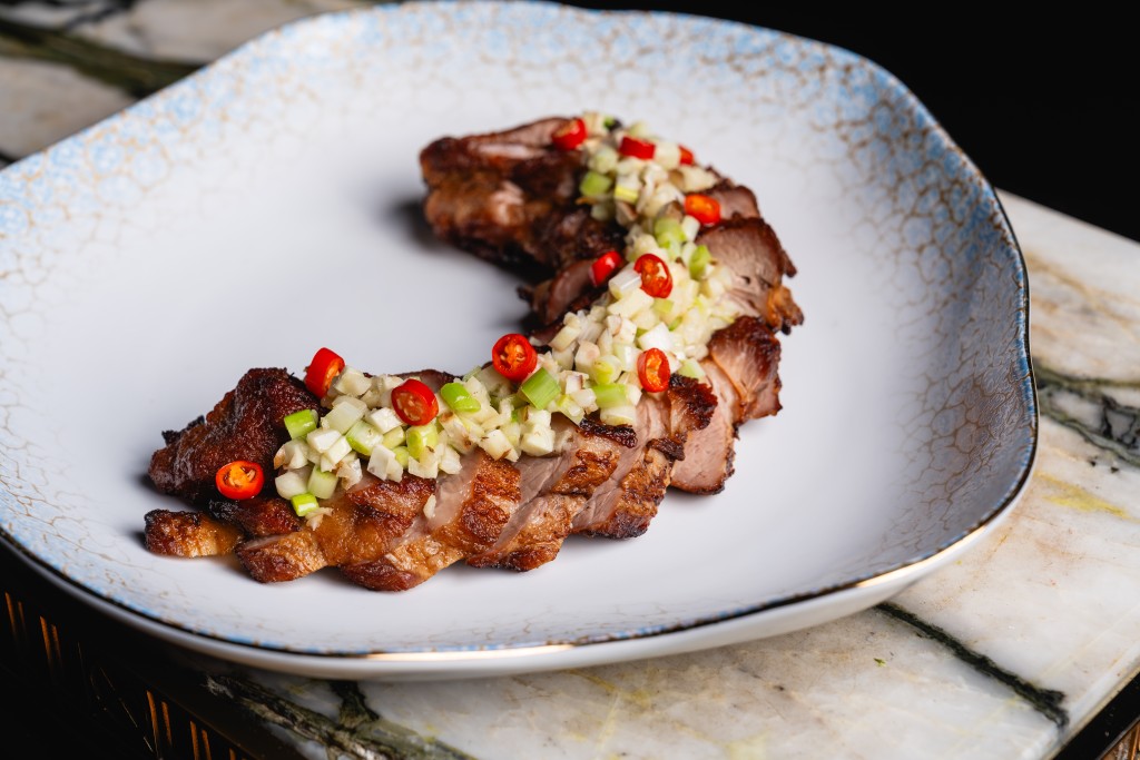 Baked 'first knife' pork collar with ginger and chilli.