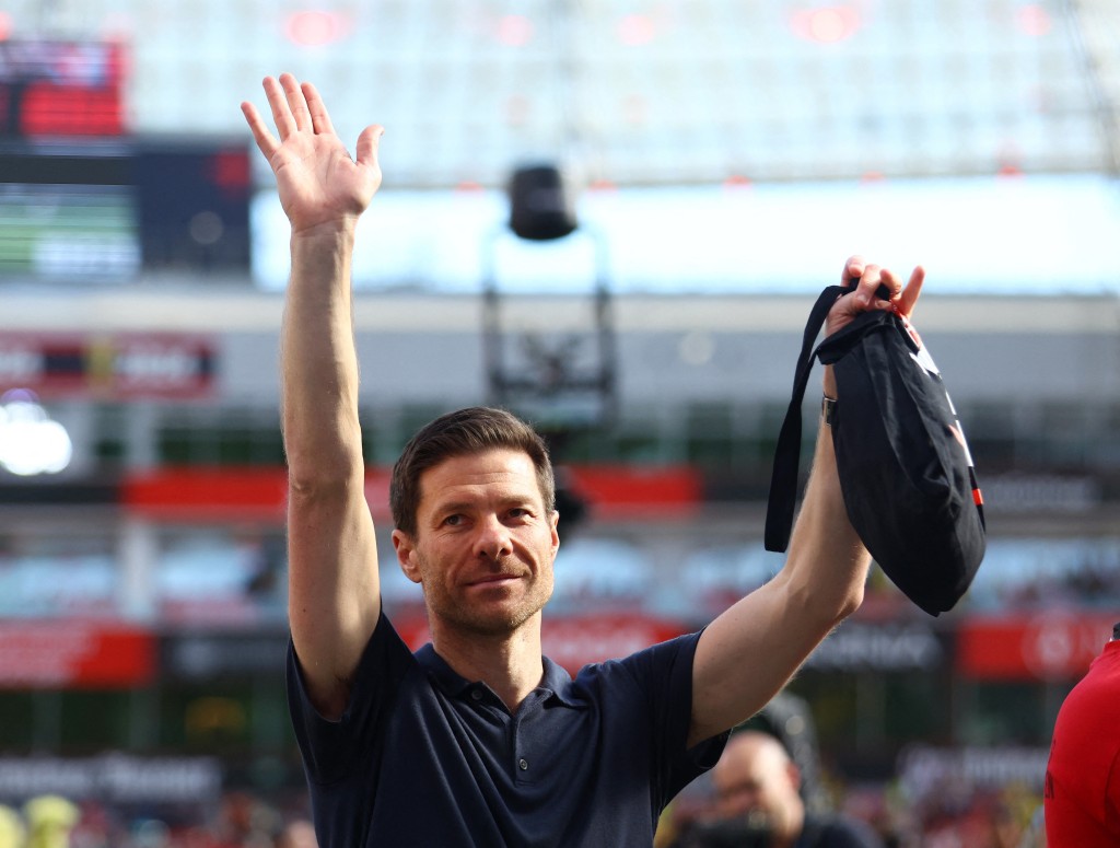 Xabi Alonso applauds fans after his last home game as Bayer Leverkusen coach. (Reuters)