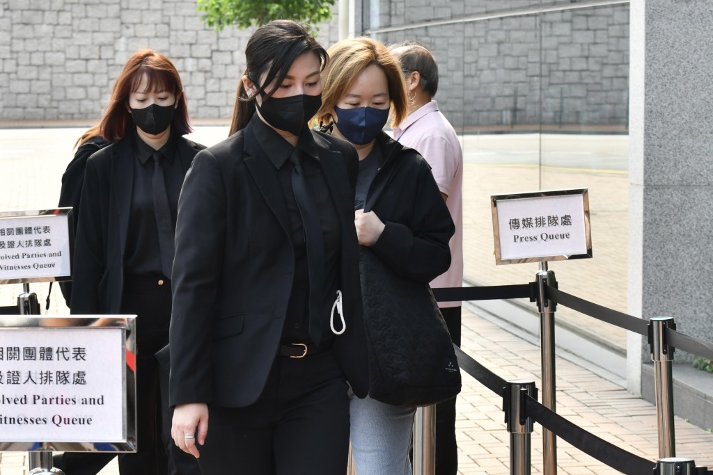 ​Lok Sin-ying (right), clerk at ISS EastPoint Properties Limited