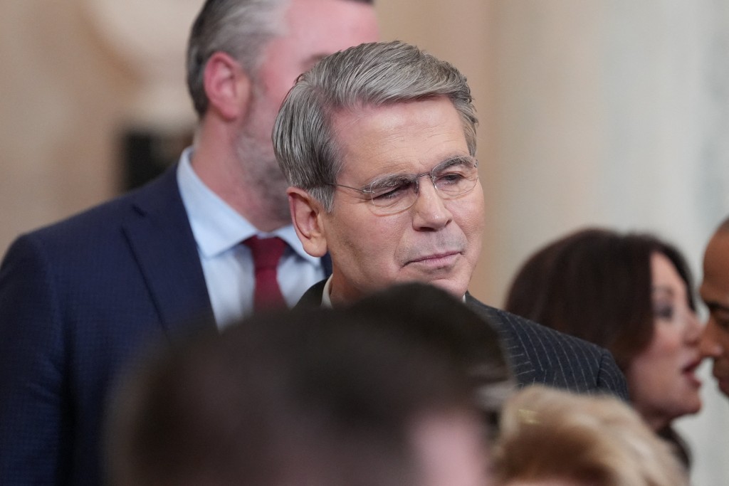 Treasury Secretary Scott Bessent stands after President Donald Trump spoke about the Iran war from the Cross Hall of the White House on Wednesday, April 1, 2026, in Washington.     Alex Brandon/Pool via REUTERS