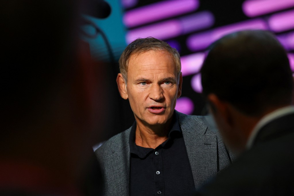 Volkswagen Group CEO Oliver Blume speaks to journalists on the press and media day of the IAA auto show in Munich, Germany, September 8, 2025.   REUTERS/Kai Pfaffenbach