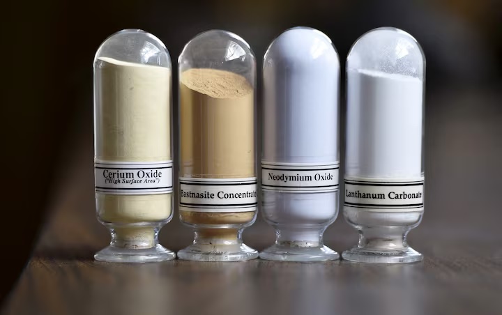 Samples of rare earth minerals from left, Cerium oxide, Bastnasite, Neodymium oxide and Lanthanum carbonate are on display during a tour of Molycorp's Mountain Pass Rare Earth facility in Mountain Pass, California June 29, 2015. REUTERS/David Becker/File Photo 