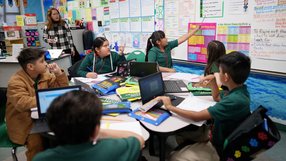 Students interact in a fourth grade classroom at William Jefferson Clinton Elementary in Compton, Calif., Thursday, Feb. 6, 2025. (AP Photo/Eric Thayer) Students interact in a fourth grade classroom at William Jefferson Clinton Elementary in Compton, Calif., Thursday, Feb. 6, 2025. (AP Photo/Eric Thayer)