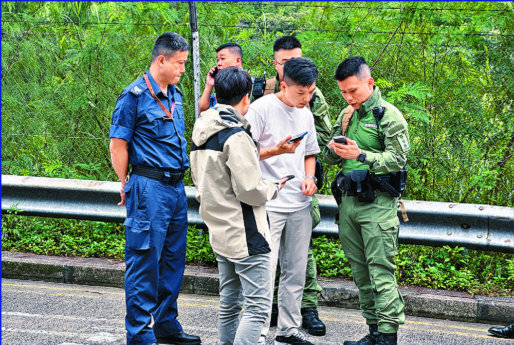 Police show passersby a picture of Matthew Tsang, below. Police show passersby a picture of Matthew Tsang, below.