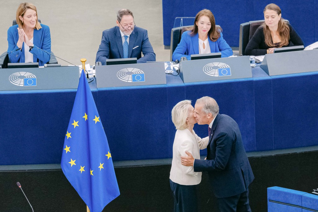 Photo by CHRISTOPHE LICOPPE / EUROPEAN UNION / AFP This handout photograph taken and released by the European Union on September 16, 2026 shows European Commission President Ursula von der Leyen (L) greeting Canada's Prime Minister Mark Carney during her annual keynote address to the European Parliament in Strasbourg, eastern France.