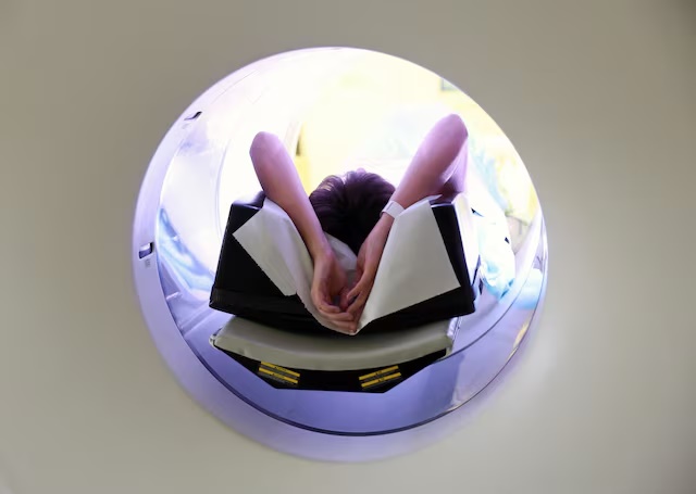 A patient goes through a PET CT scan at the Nuclear Medicine department of University College London Hospitals (UCLH), in London, Britain, January 29, 2025. REUTERS/Isabel Infantes/File Photo 