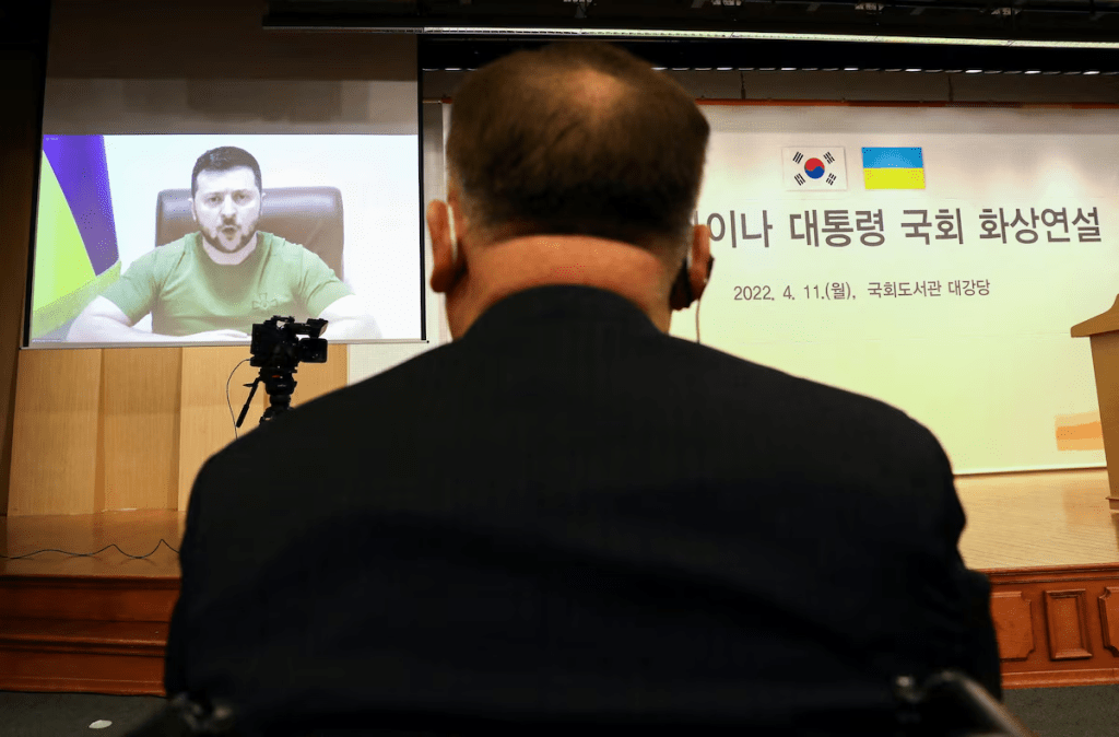 Ukrainian President Volodymyr Zelenskiy addresses South Korean parliament via video link at National Assembly in Seoul, South Korea April 11, 2022. Chung Sung-Jun/Pool via REUTERS