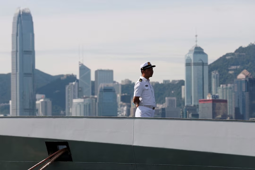 A People's Liberation Army (PLA) Navy troop stands on the deck of a navy ship during an open day of Stonecutters Island naval base, in Hong Kong, China, June 30, 2019. REUTERS/Tyrone Siu/File Photo A People's Liberation Army (PLA) Navy troop stands on the deck of a navy ship during an open day of Stonecutters Island naval base, in Hong Kong, China, June 30, 2019. REUTERS/Tyrone Siu/File Photo