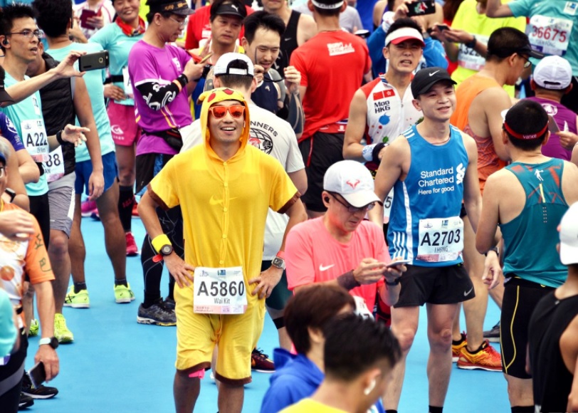 Runners dressed up during a previous marathon. Runners dressed up during a previous marathon.