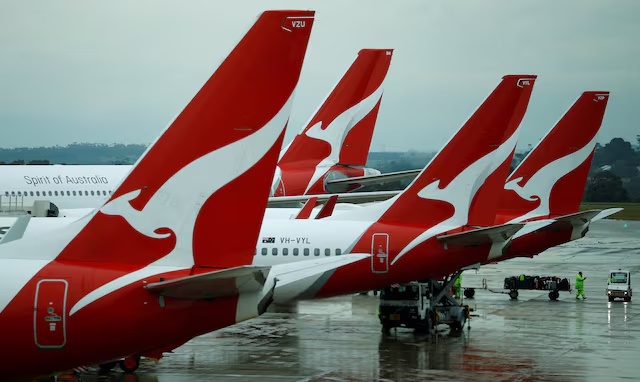 Qantas aircraft are seen on the tarmac at Melbourne International Airport in Melbourne, Australia, November 6, 2018. REUTERS/Phil Noble/File Photo