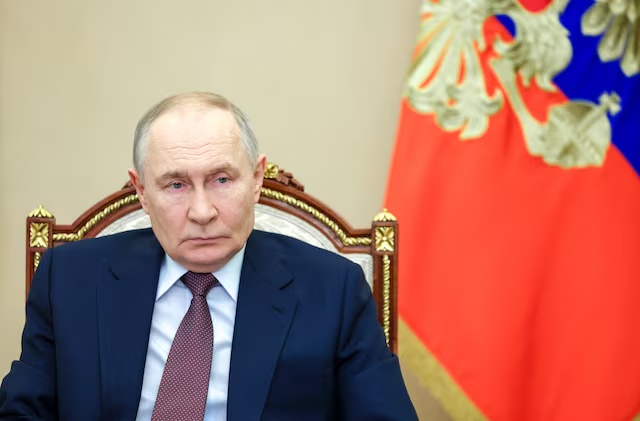 Russian President Vladimir Putin chairs a meeting with members of the government via video link at the Kremlin in Moscow, Russia January 21, 2026. Sputnik/Vyacheslav Prokofyev/Pool via REUTERS