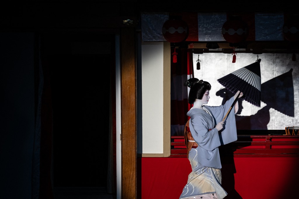 Photo by PHILIP FONG / AFP  A geisha takes part in a rehearsal for the annual "Miyako Odori" -- which means "capital city dance" in Japanese, at the Gion Kobu Kaburenjo in Kyoto on March 31, 2026.
