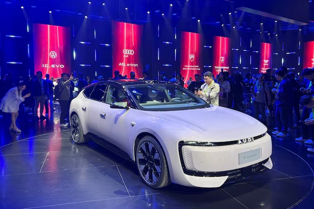 The Audi E5 Sportback, the first model of Audi's series of electric vehicles (EVs) jointly developed with SAIC, is showcased at a Volkswagen event in Shanghai, China April 22, 2025. REUTERS/Zoey Zhang/File Photo 