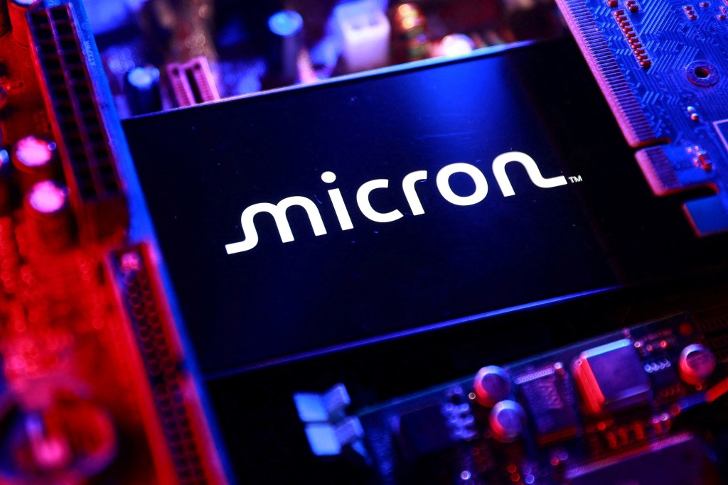 A Micron logo and a computer motherboard appear in this illustration taken August 25, 2025. REUTERS/Dado Ruvic