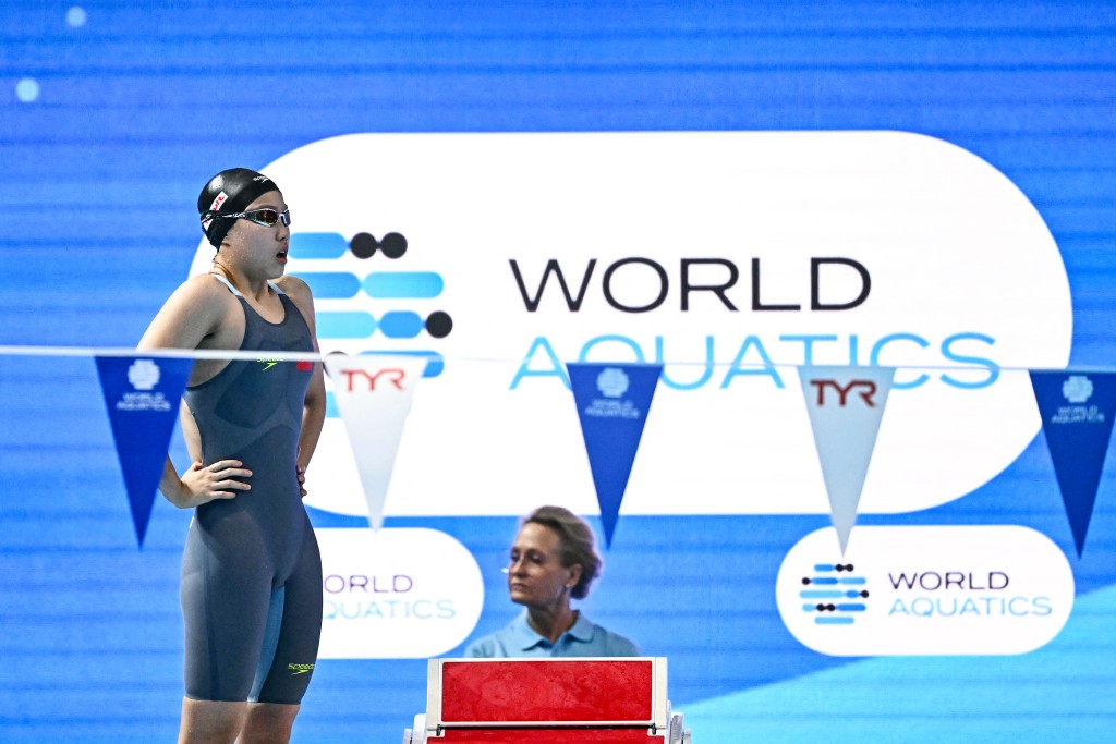 China's swimmer Yu Zidi prepares for a heat of the women's 200m individual medley swimming event during the 2025 World Aquatics Championships in Singapore on July 27, 2025. (AFP)