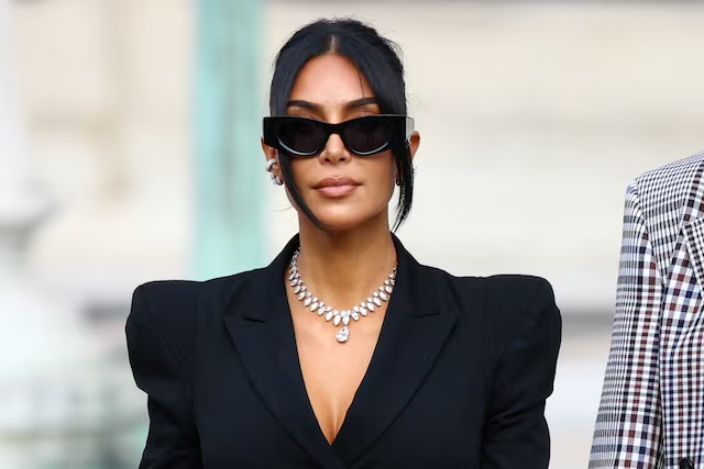 Kim Kardashian leaves the courthouse after testifying in the trial of 10 people accused of stealing millions of dollars worth of jewellery from her, who was held at gunpoint in her apartment during Paris fashion week in 2016, a trial known as the "Rue Tronchet" affair, in Paris, France, May 13, 2025. REUTERS/Piroschka van de Wouw