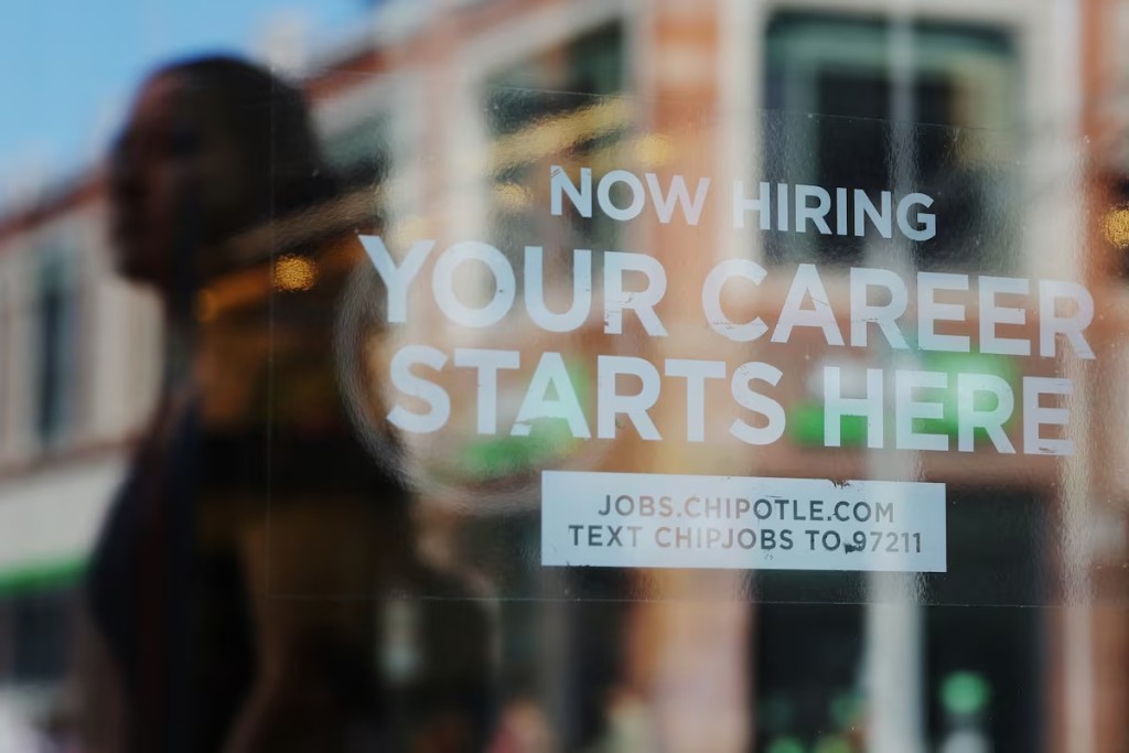 A Chipotle restaurant advertises it is hiring in Cambridge, Massachusetts, U.S., August 28, 2023. REUTERS