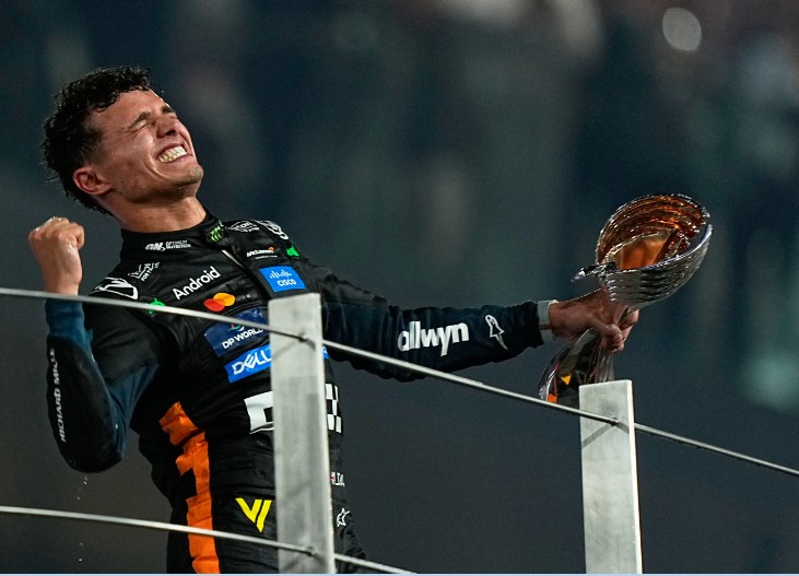 Lando Norris celebrates winning the Formula 1 world title for the first time. AP