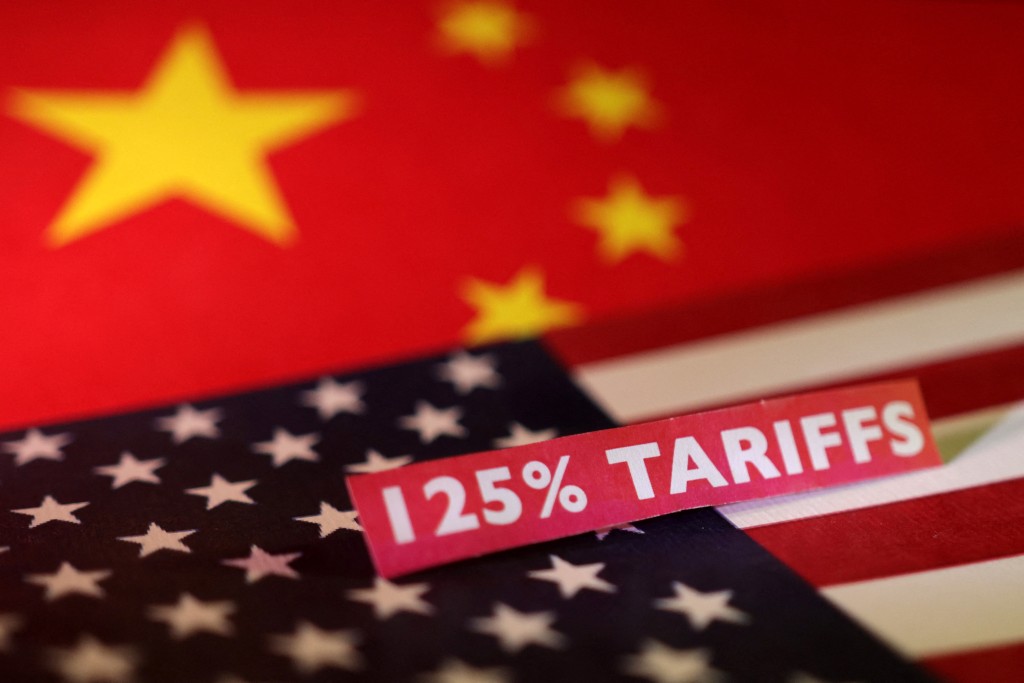 U.S. and Chinese flags and a "125% tariffs" label are seen in this illustration taken April 10, 2025. REUTERS