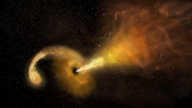 An artist's concept of a tidal disruption event that happens when a star passes fatally close to a supermassive black hole, which reacts by launching a relativistic jet, in this handout image released on June 15, 2018 and obtained by Reuters on February 5, 2026. NRAO/AUI/NSF/NASA/Handout via REUTERS 