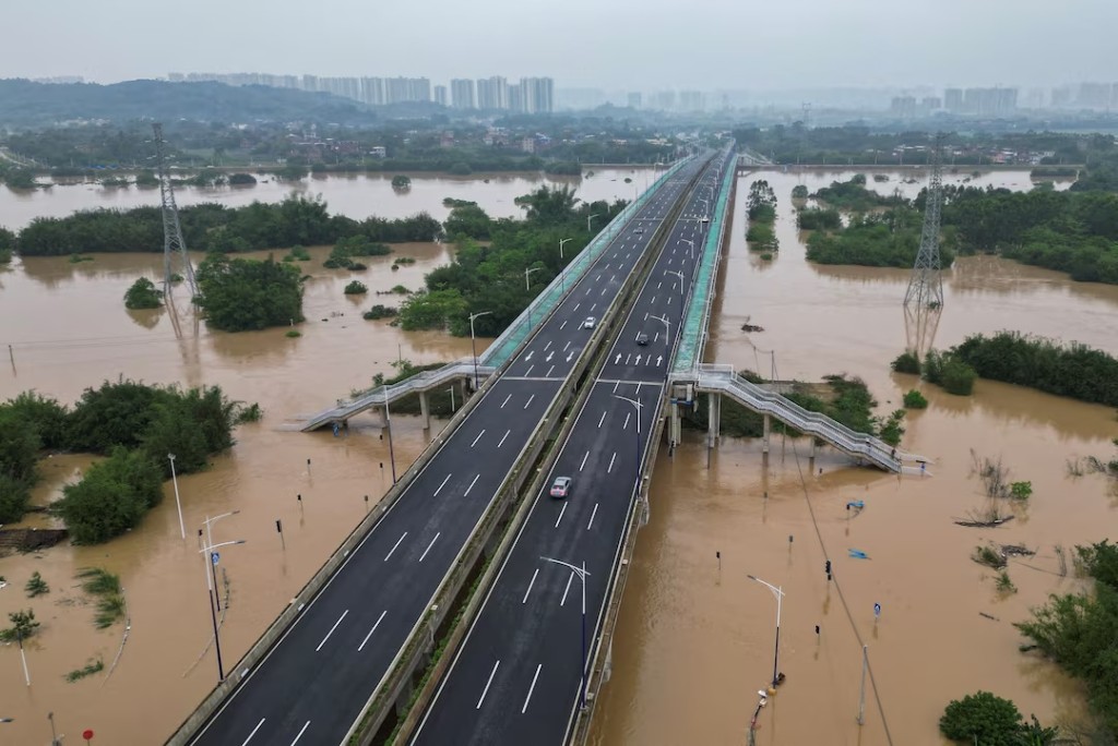 A drone view shows roads submerged in floodwaters following heavy rainfall, in Qingyuan, Guangdong province, China April 22. REUTERS/Tingshu Wang