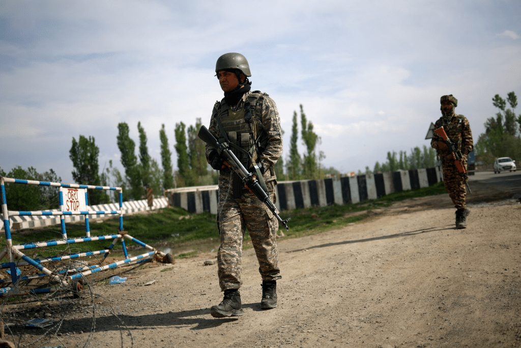 Members of Indian security personnel patrol on a highway leading to South Kashmir's Pahalgam, following a suspected militant attack, in Marhama village, in Kashmir, April 23, 2025. REUTERS/Adnan Abidi
