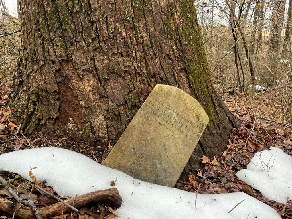 Photo by VICTORIA LAVELLE / AFP  An abandoned 19th-century grave is seen on the grounds of the House of Reformation for Colored Children, a closed down segregated juvenile detention facility that operated in the late 19th and early 20th century, in Cheltenham, Maryland, on February 17, 2026.