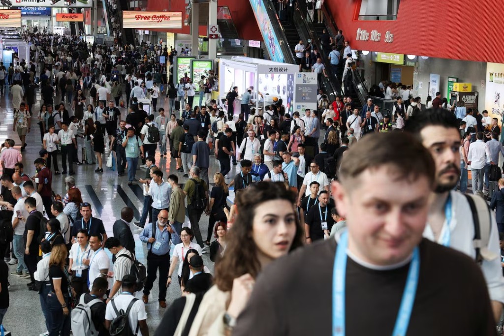 People visit the China Import and Export Fair, commonly known as the Canton Fair, in Guangzhou, Guangdong province, China, April 15, 2026. REUTERS/Go Nakamura 