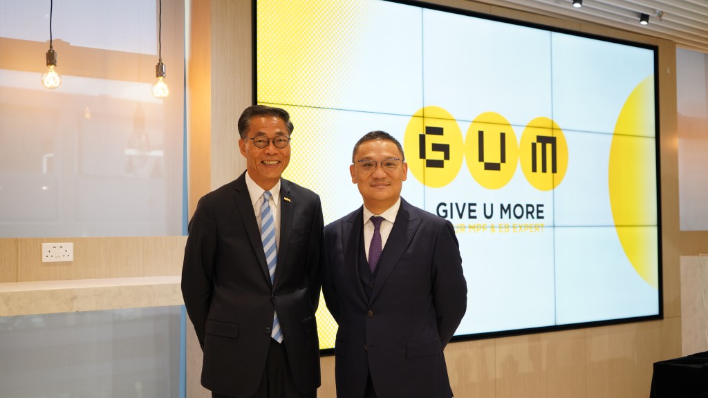 Christopher Lau, right, and GUM managing director Michael Chan. GUM