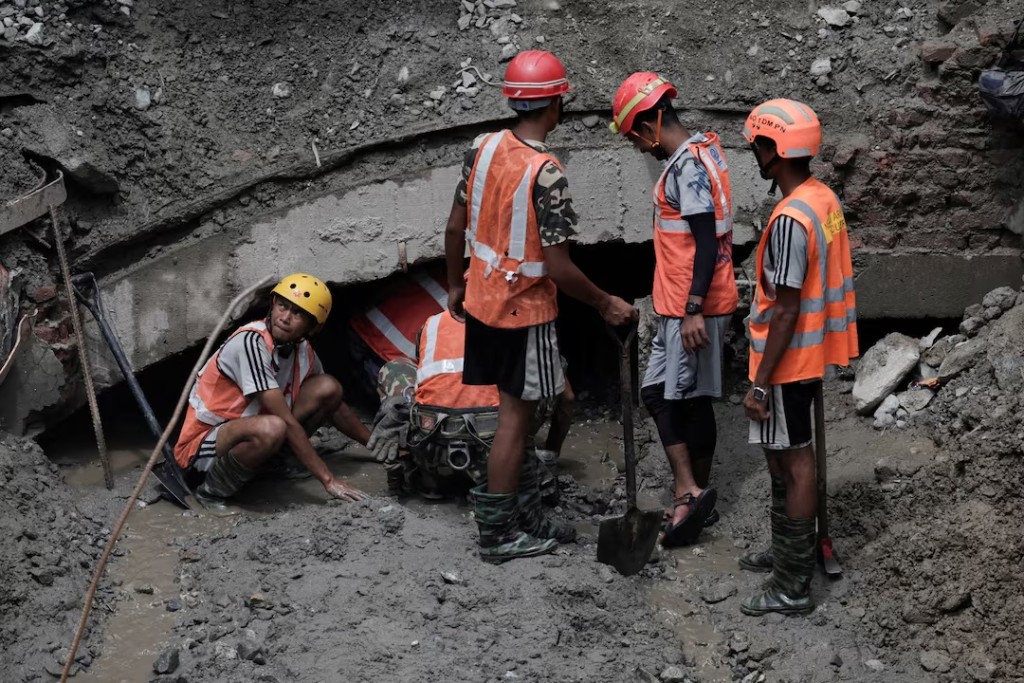 Rescue team members work to enter the tunnel at the Upper Trishuli 3A Hydropower Station as they search for survivors and retrieve bodies in Rasuwa, Nepal, September 3, 2026. REUTERS/Navesh Chitrakar